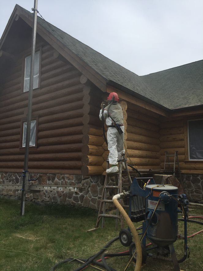 Air Sanding Log Home Repair 